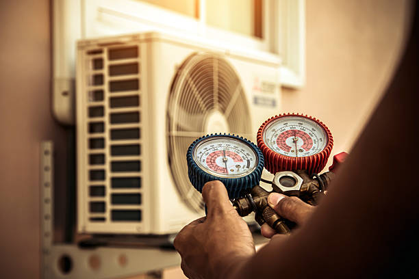 Professional Air Conditioning Service technician working in Moreno Valley, CA